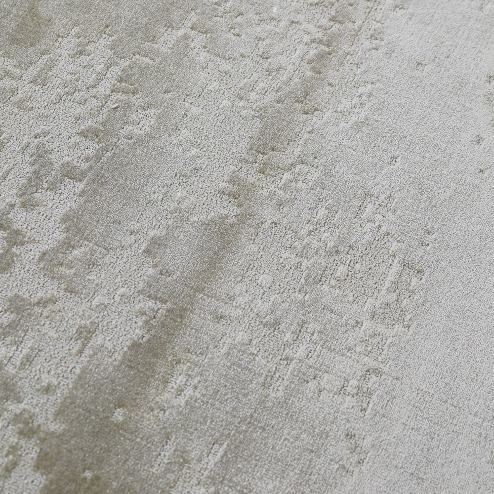 Textured Radiant Solitude woven rug in soft tones, perfect for modern interiors.