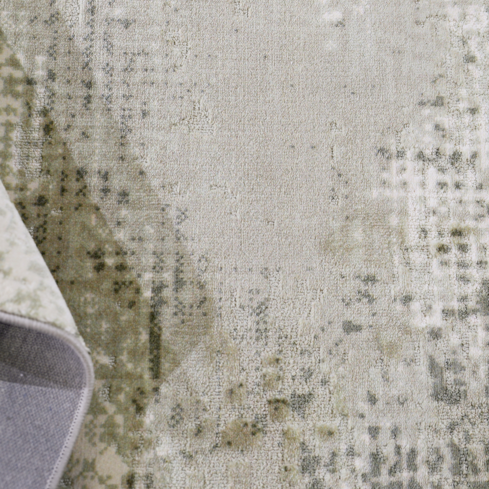 Textured gray and beige Veiled Eternity blended woven rug detail.