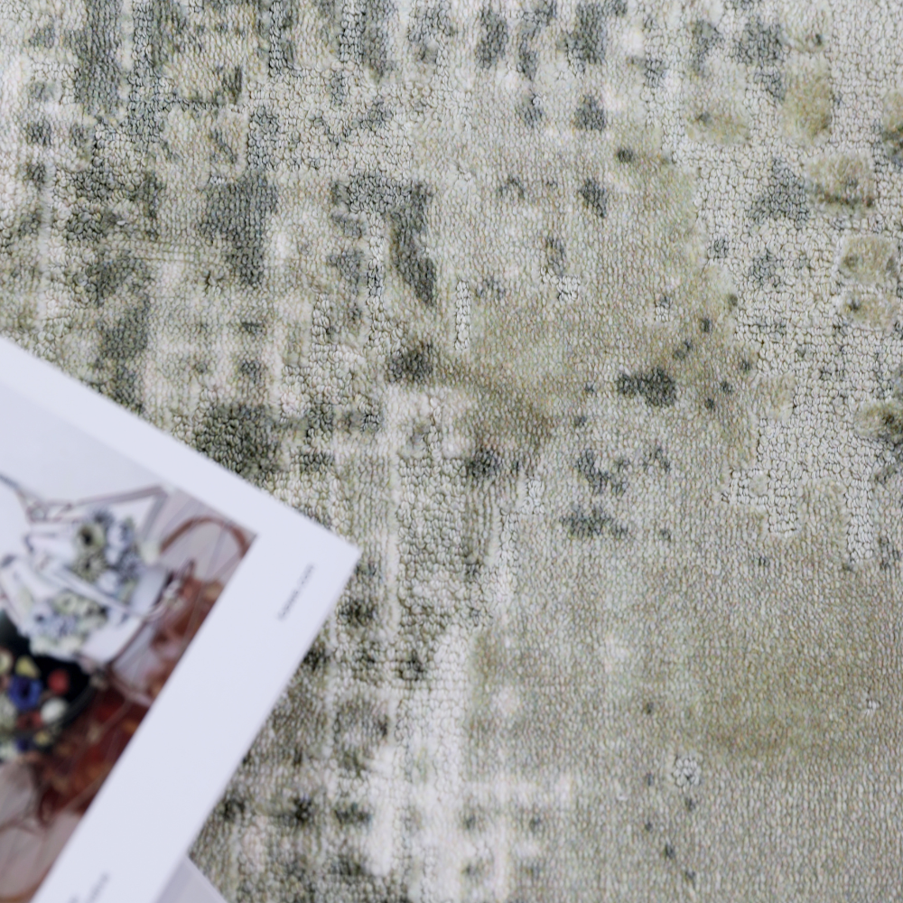 Textured Veiled Eternity blended woven rug in gray and beige colors.