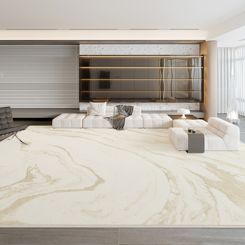 Elegant cream and gold marble design rug in modern living room