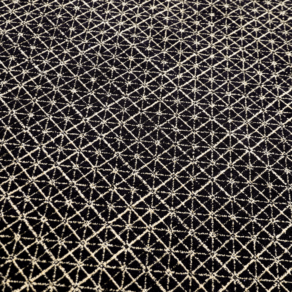 Black and gold geometric pattern rug ideal for modern home decor