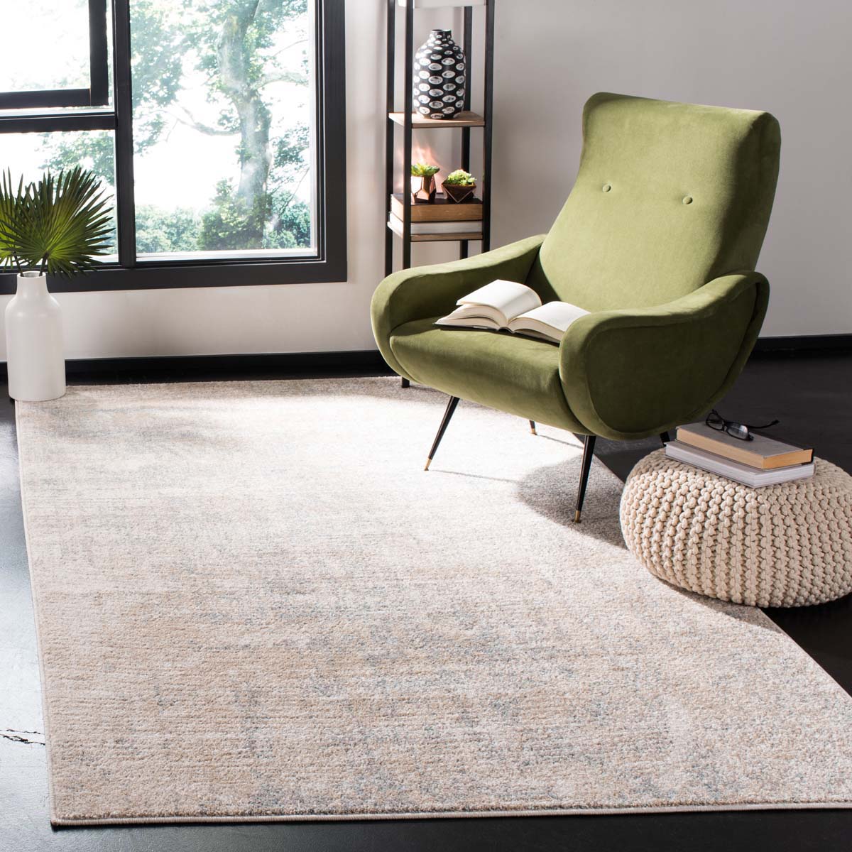 Harmonious Sunset Seren rug with neutral tones and blue accents in a stylish living space.