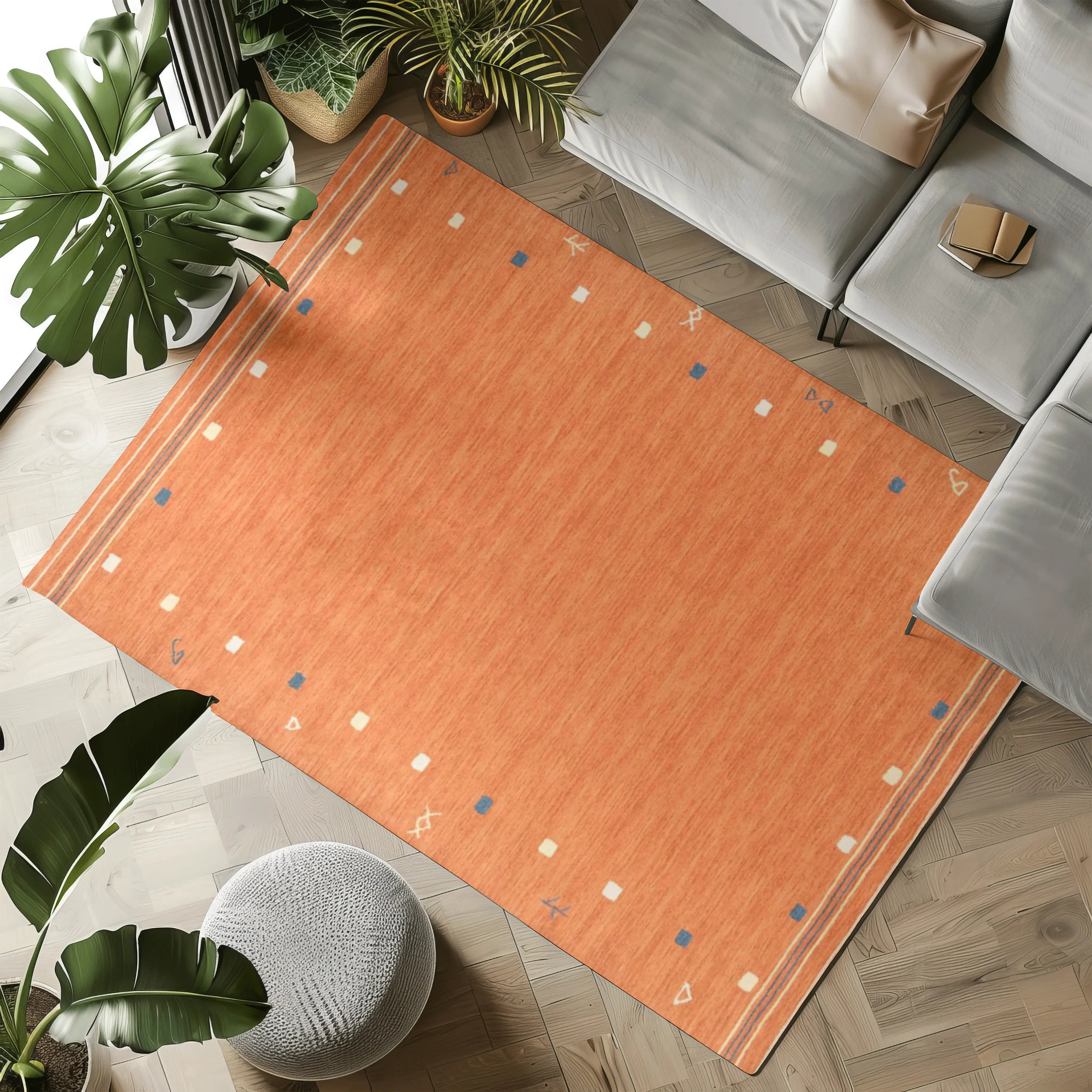 Washable orange geometric rug with blue and cream accents for modern homes