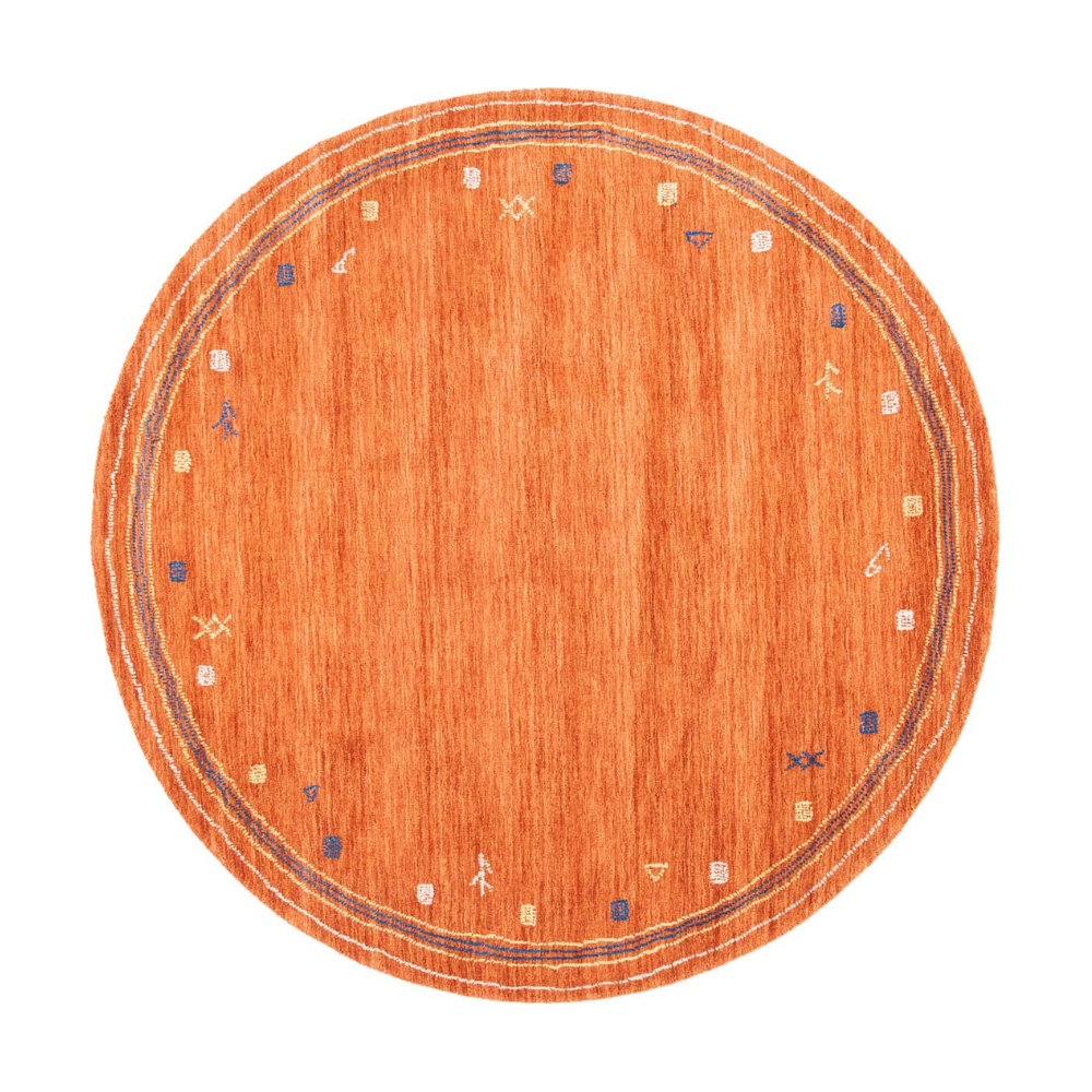 Round orange geometric rug with blue and cream accents for stylish home interiors.