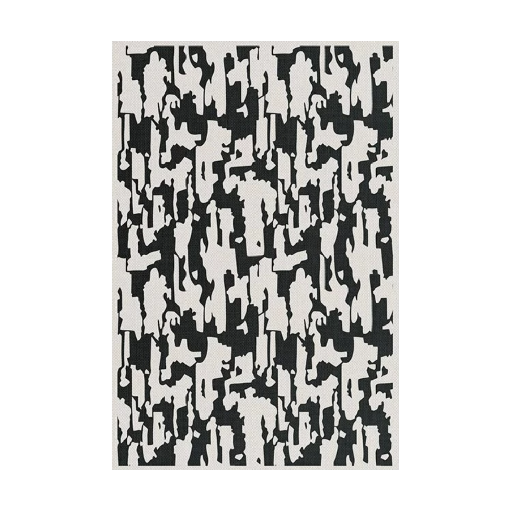 Evadne modern washable rug with abstract black and white design