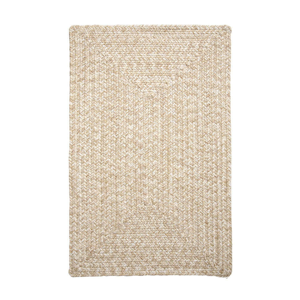 Beige hand-braided outdoor rug with textured design