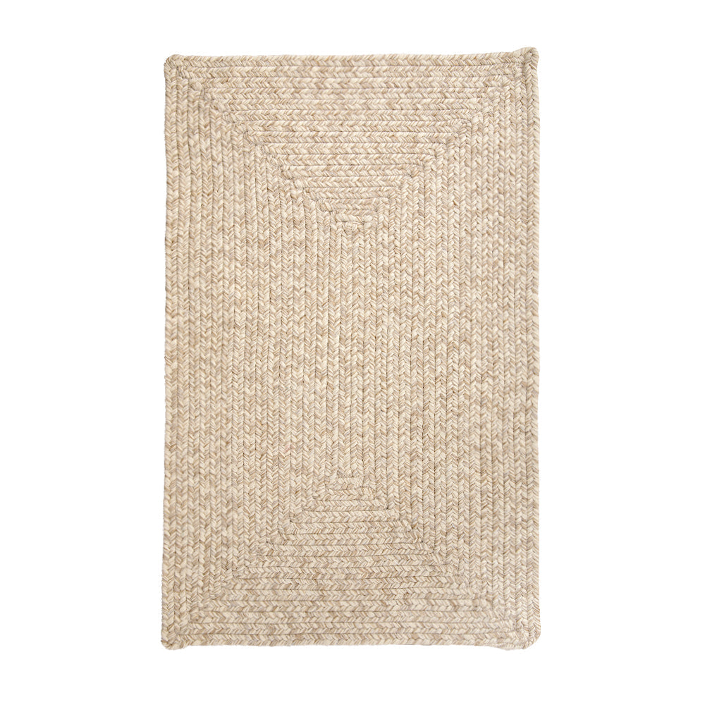 Liam hand-braided outdoor rug in beige color, customizable size.