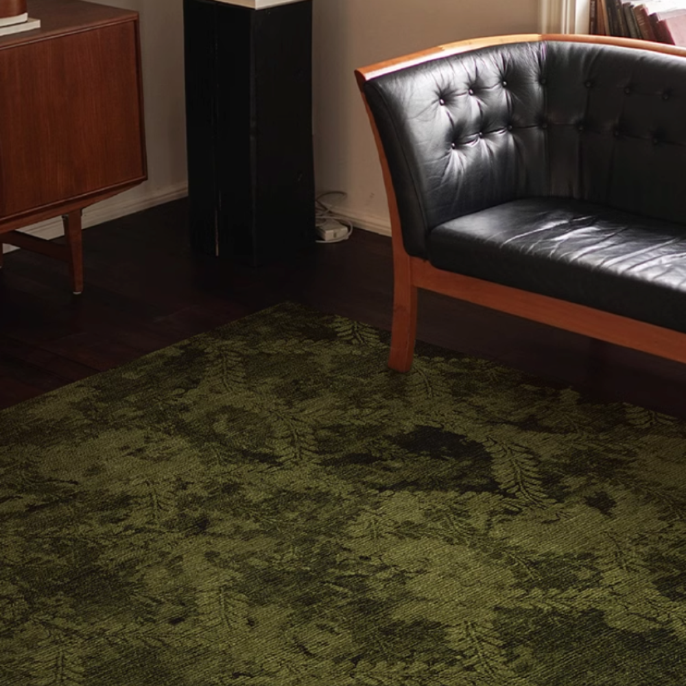 Isabeau green botanical washable rug enhancing a chic living room design.