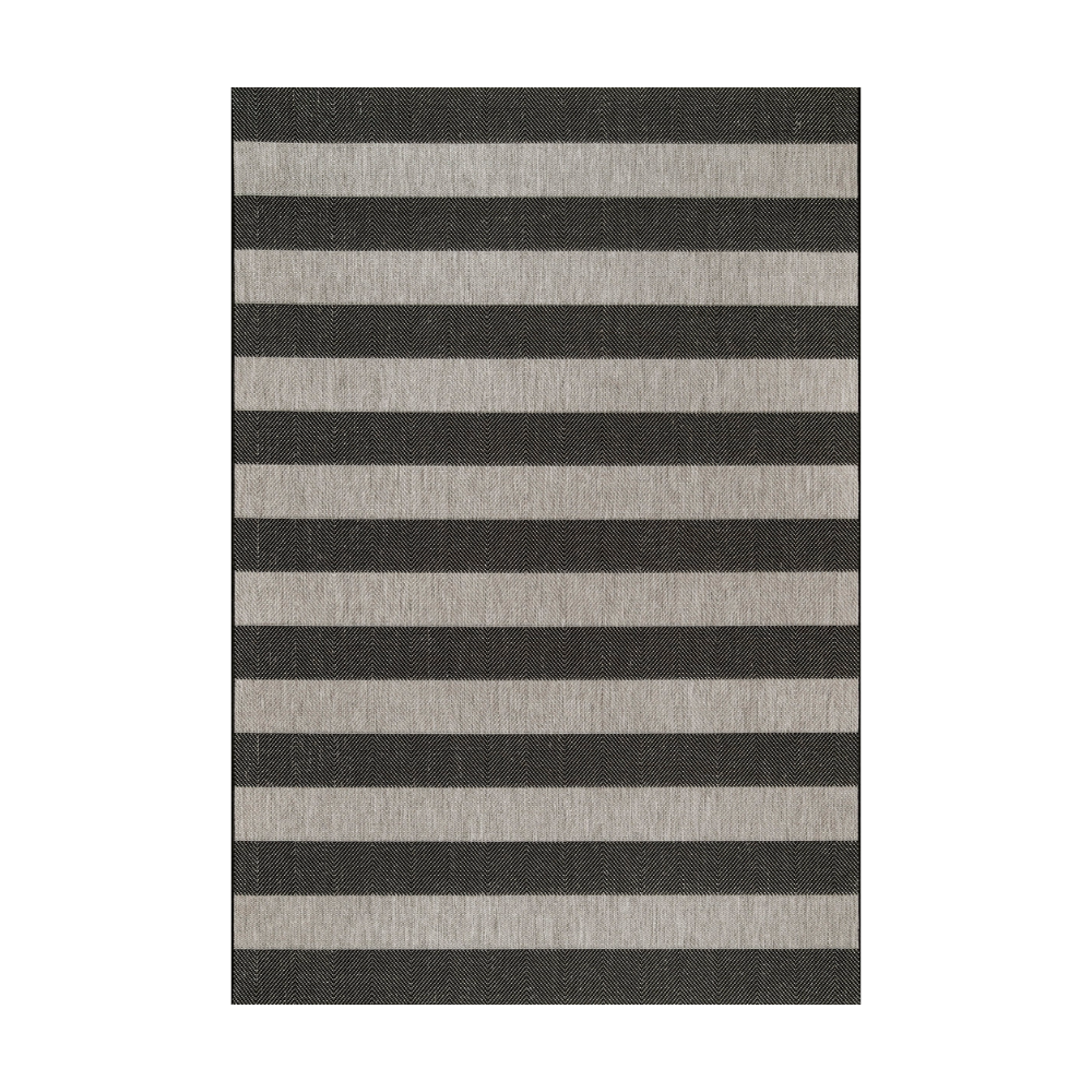 Vesper Stripes Washable Rug in black and cream, perfect for modern home decor.