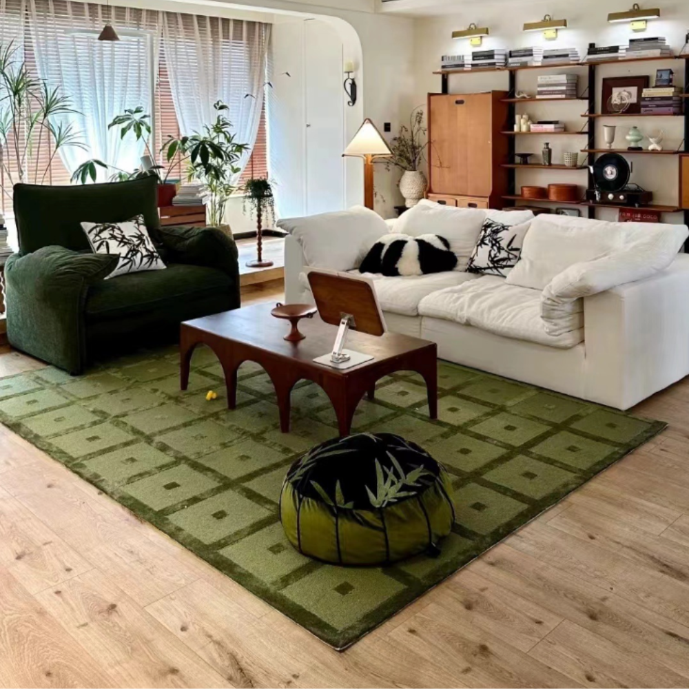 Valerian Checkered Washable Rug in green tones enhancing a stylish living room.