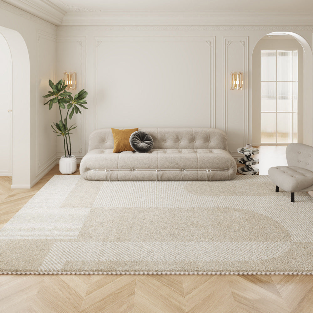 Beige geometric rug enhancing modern living room decor