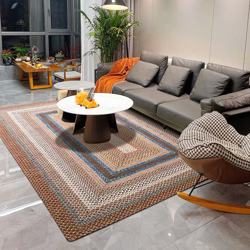 Multicolored Ringed Circle Vintage Outdoor Woven Rug in modern living room setting.