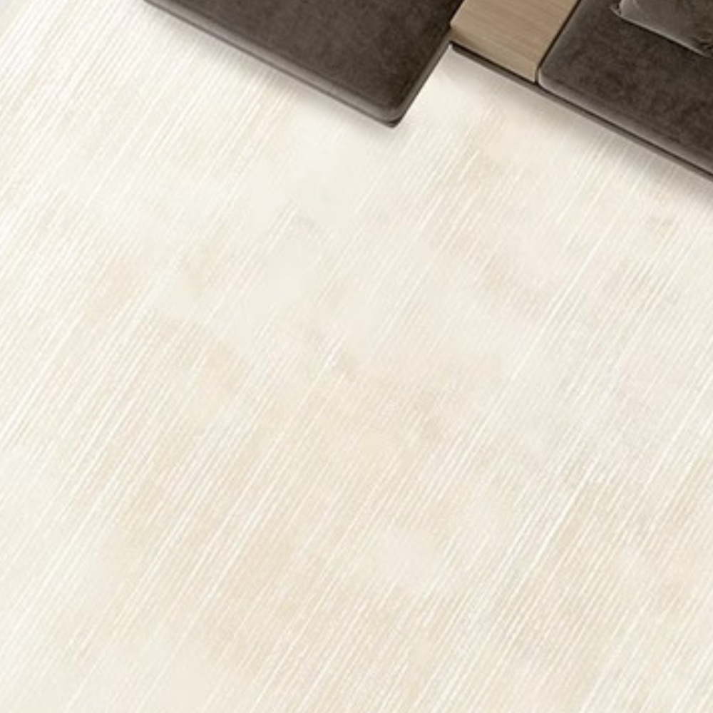 Cream Velvet Dawn Modern Rug close-up, showcasing textured surface and minimalist design.