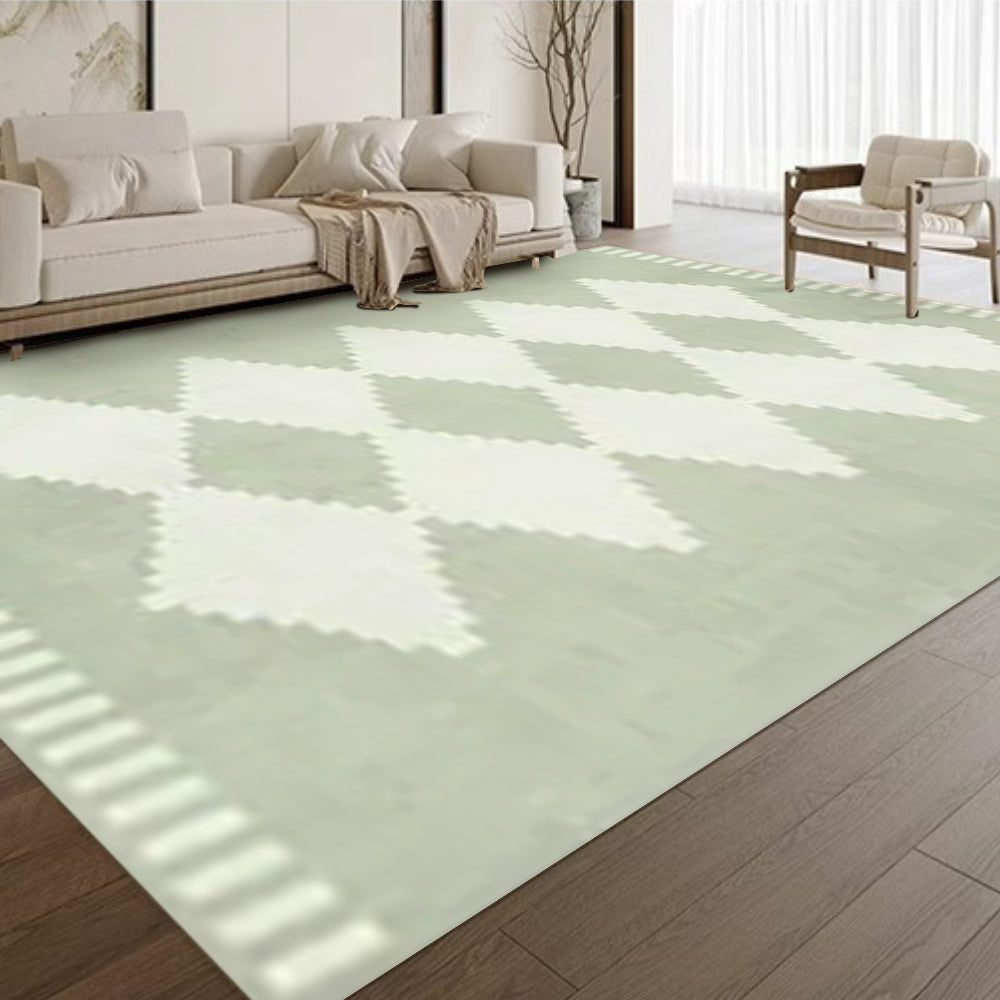 Green vintage geometric rug in a bright modern living room.
