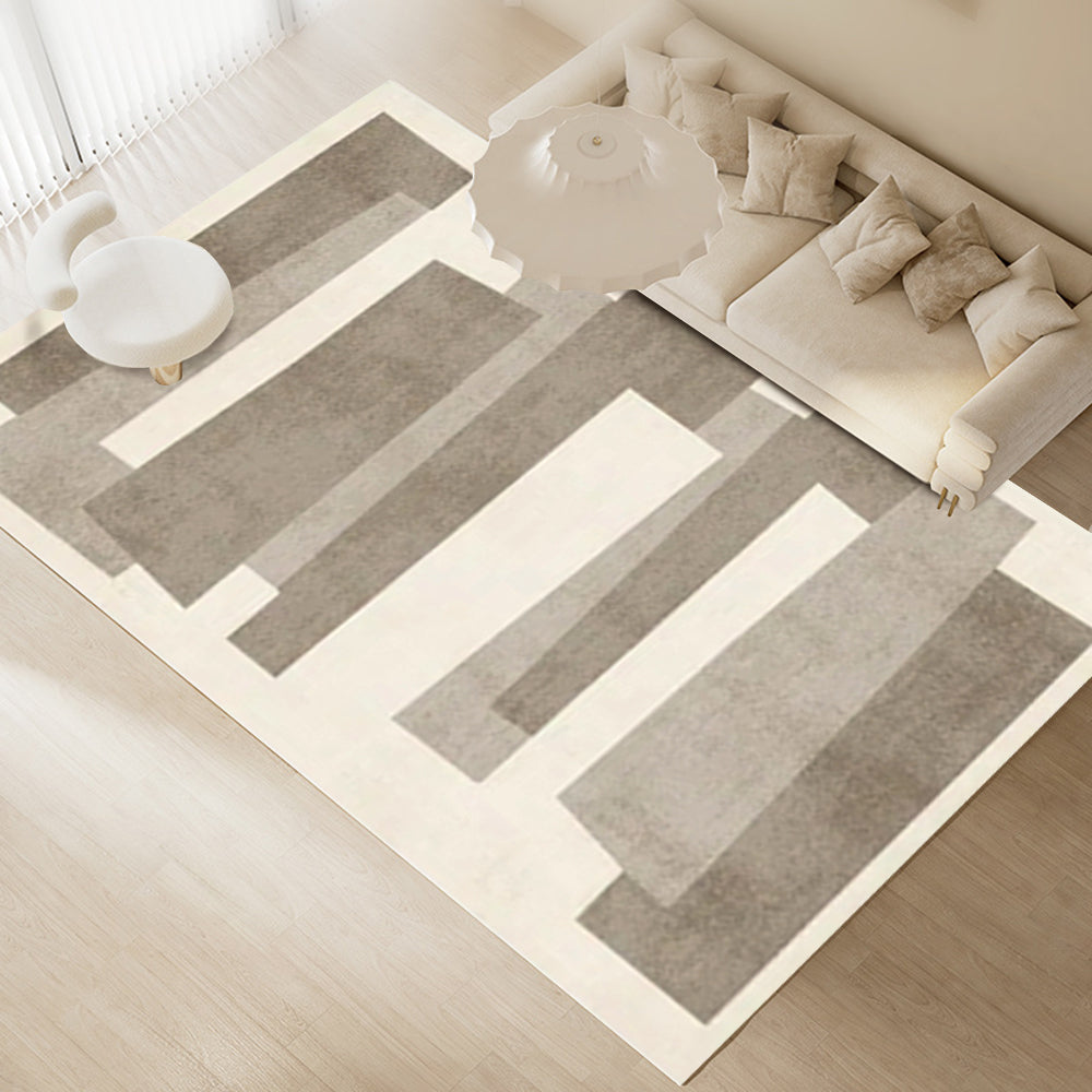 Beige geometric abstract rug enhancing modern minimalist living room decor