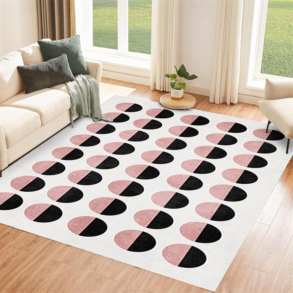 Geometric pink and black half-circle rug in a contemporary living room