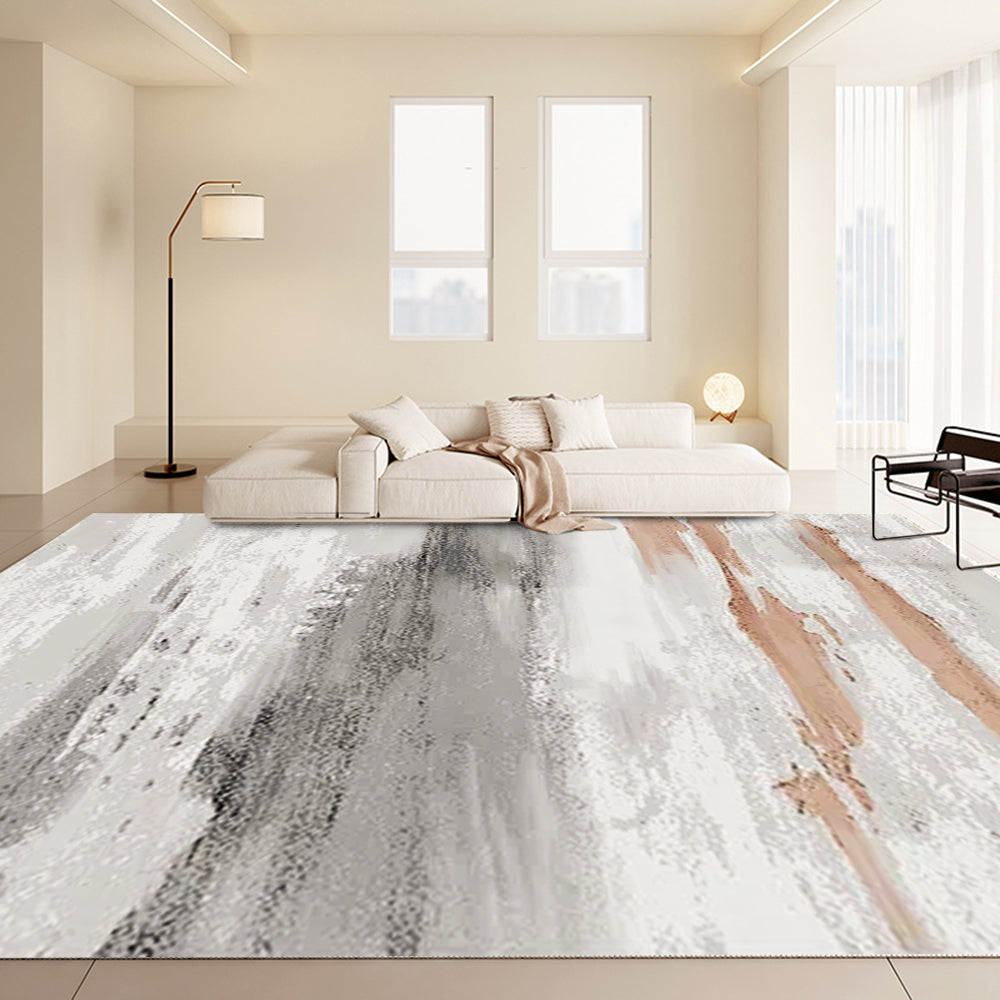 Ink Art Stria rug in gray and rose gold, enhancing modern living room decor.
