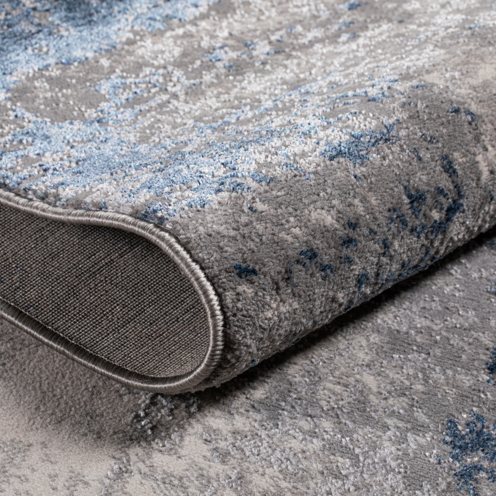 Machine-washable gray and blue abstract rug for contemporary interiors