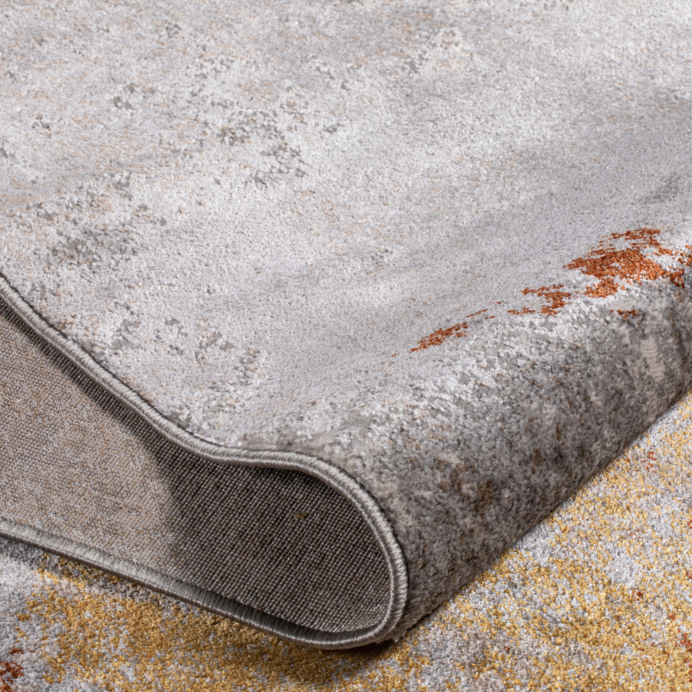 Hope Abstract Textured Rug with gray and orange design, ideal for contemporary interiors.