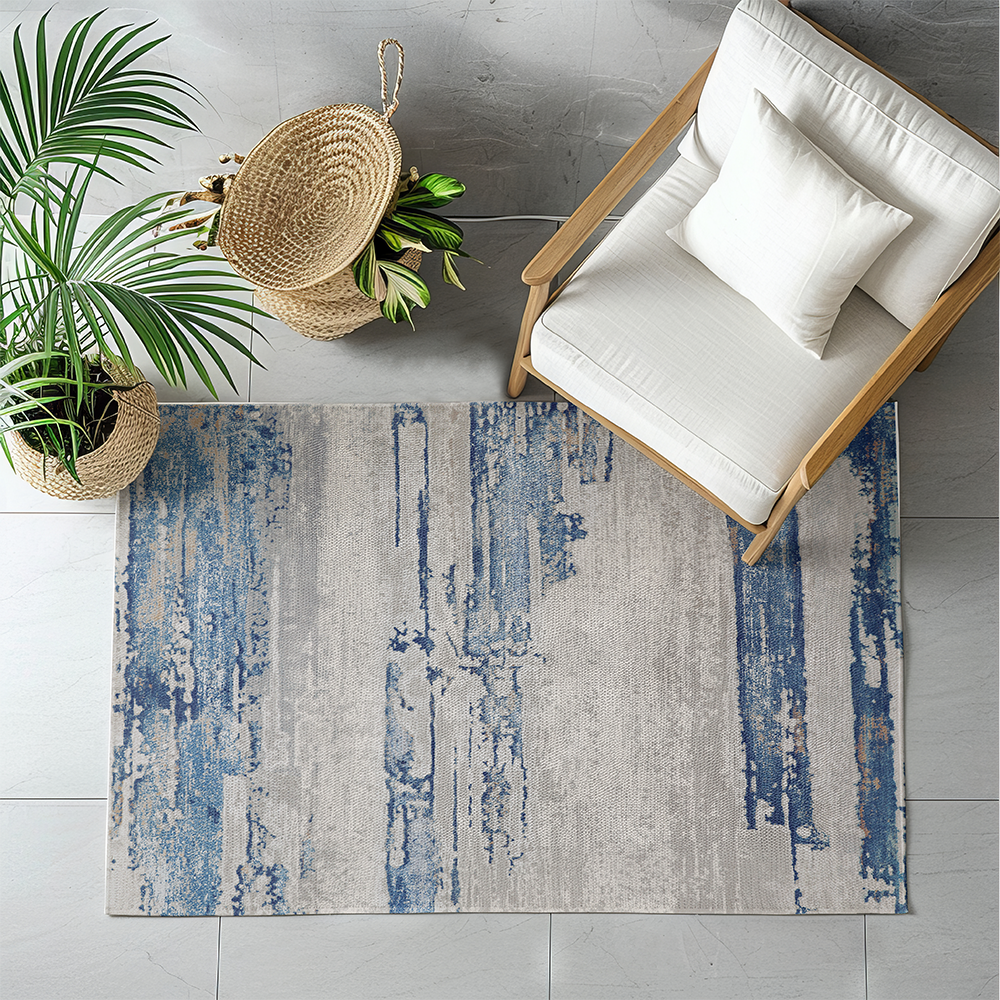 Juno Abstract Textured Rug in blue and gray, ideal for contemporary decor.