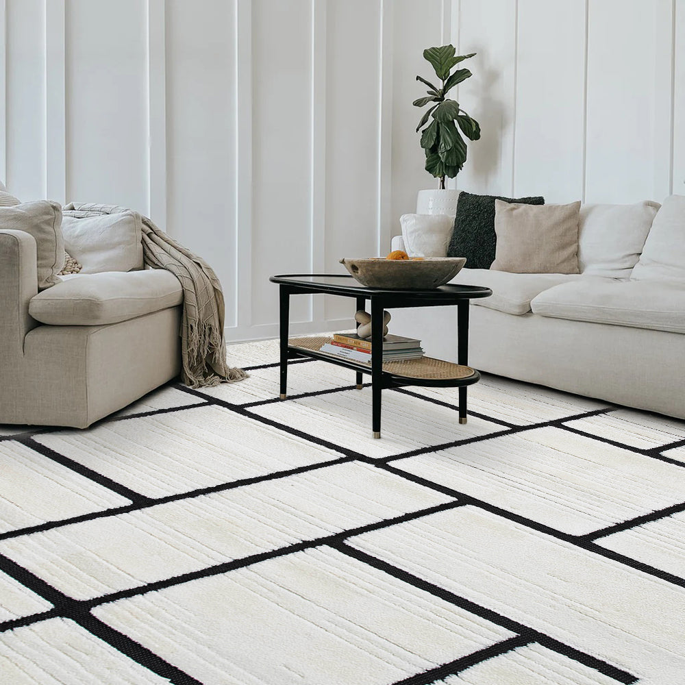 Modern living room with Eldrin geometric rug in cream and black pattern