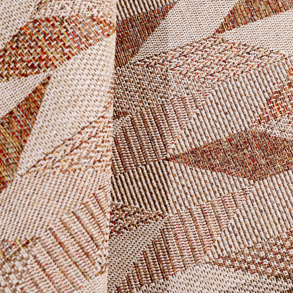 Braided woven rug with geometric patterns in beige and brown hues