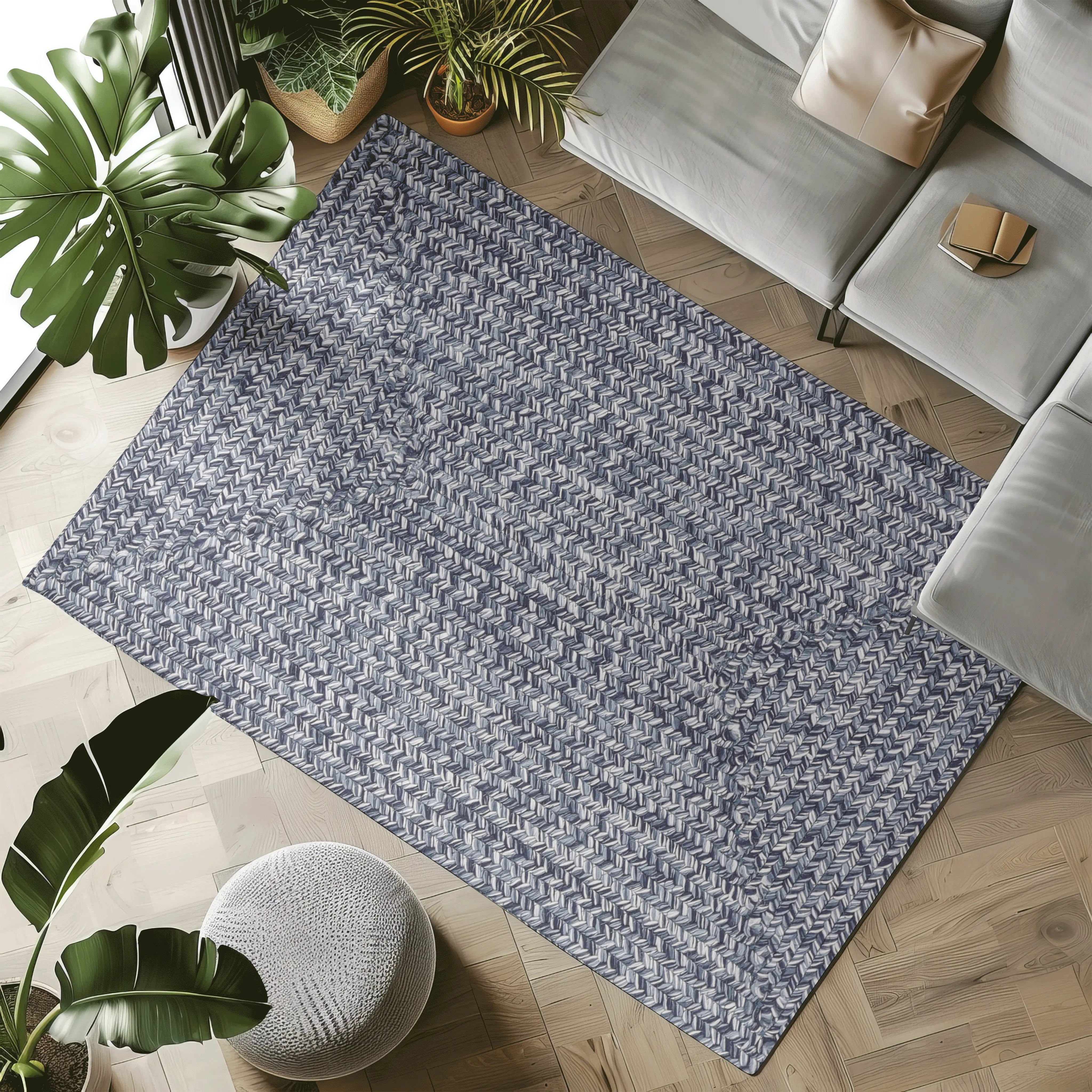 Blue and white chevron outdoor rug in modern living room setting
