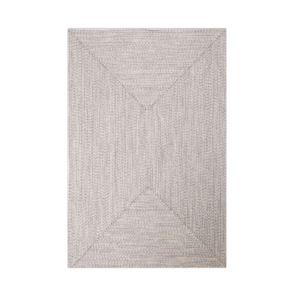Light gray hand-braided outdoor rug with textured design.