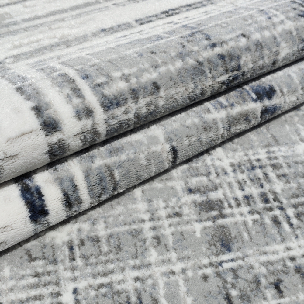 Flora Abstract Textured Rug in gray and navy geometric design