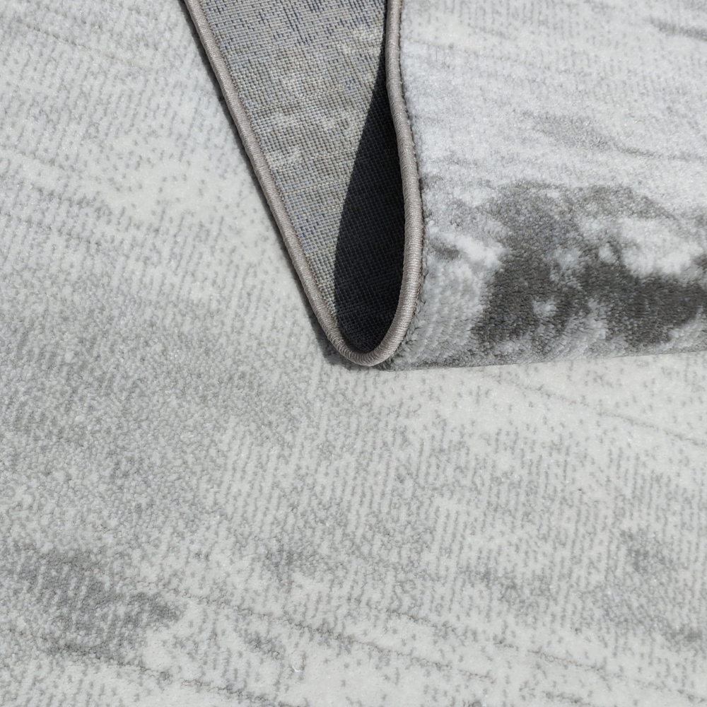 Gavin Abstract Textured Rug in gray and blue, ideal for modern home interiors.