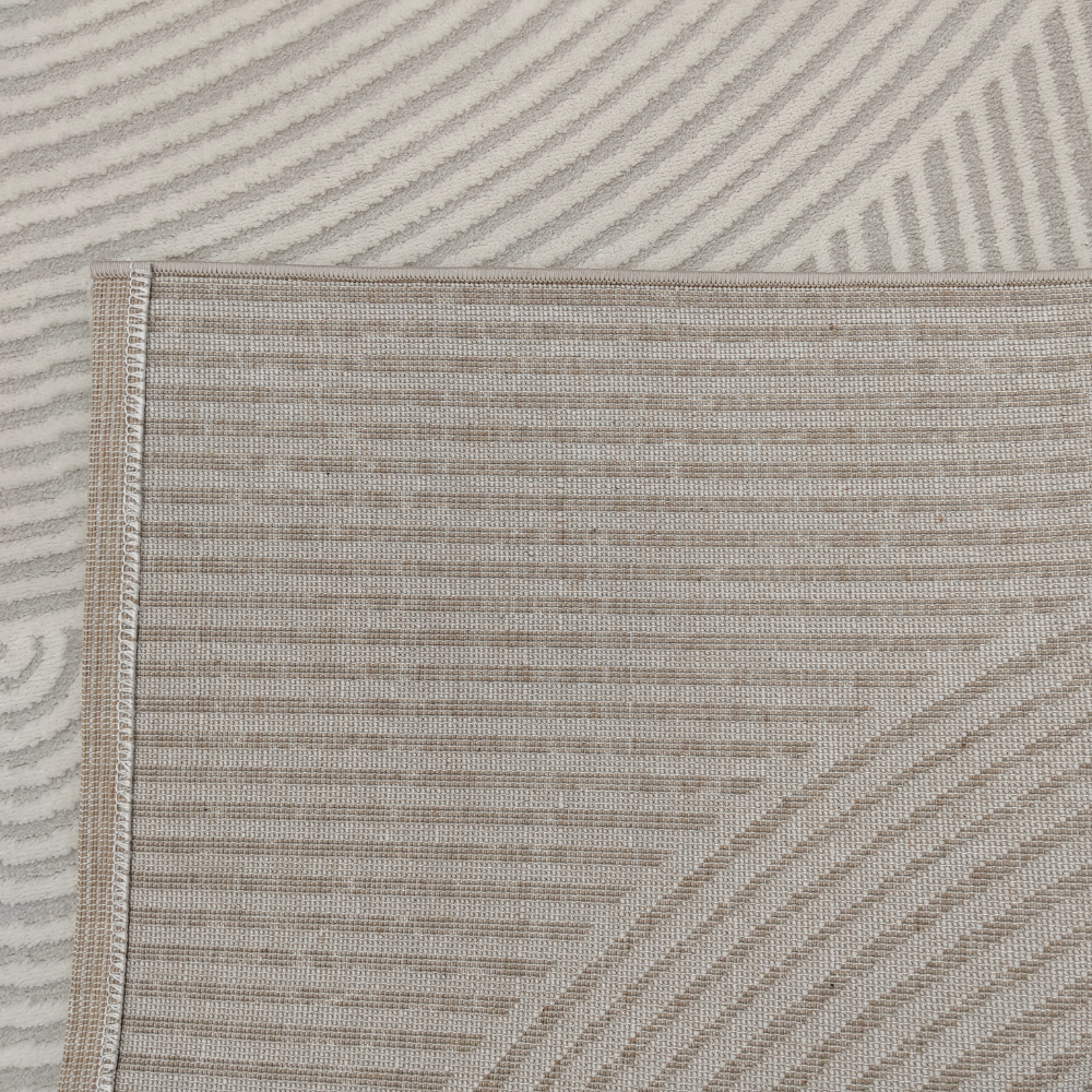 Elowen Stripes Textured Rug close-up with neutral tones and modern design patterns.