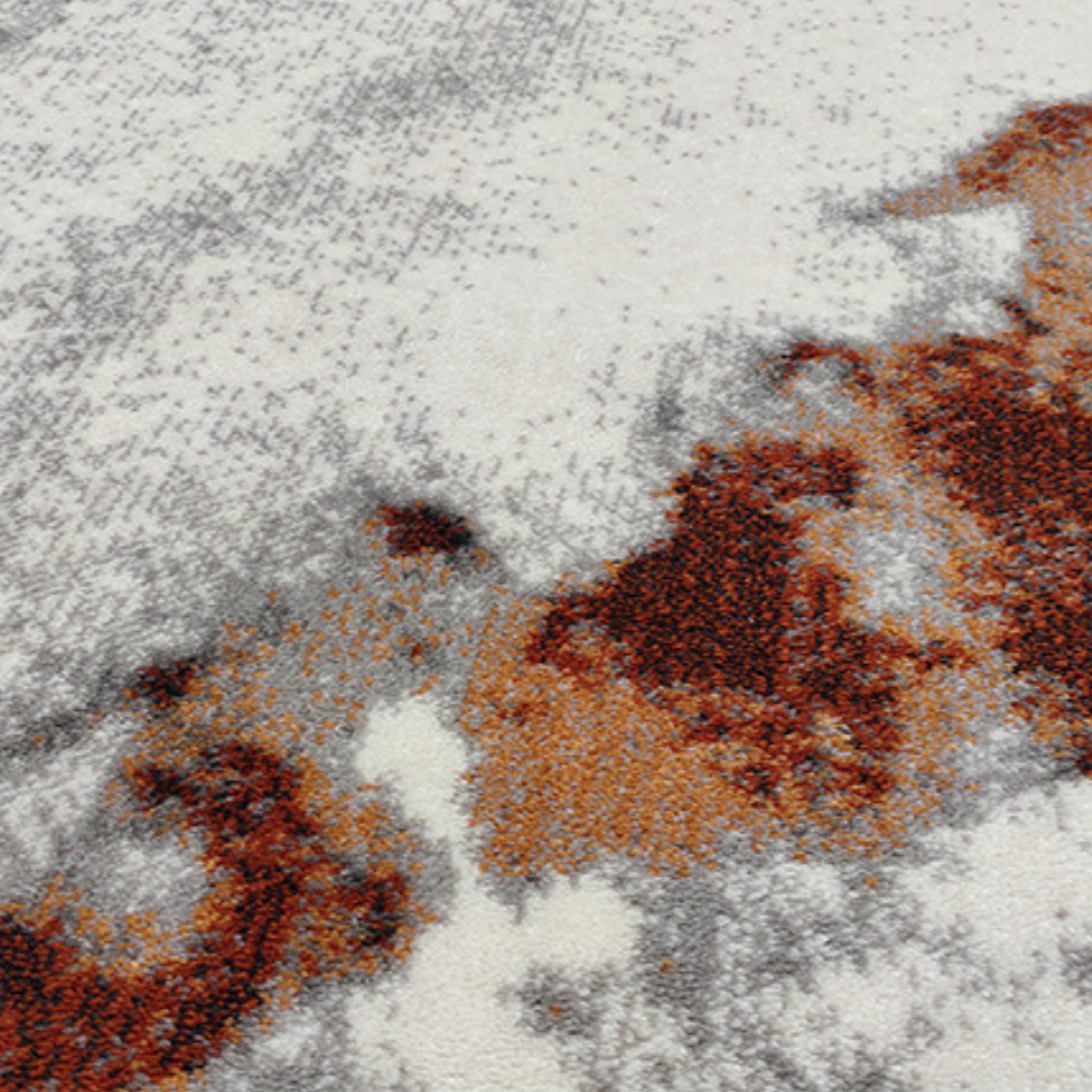 Iris Abstract Textured Rug in gray and rust, ideal for contemporary washable home decor.