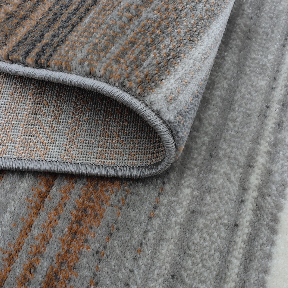 Bastian Abstract Textured Rug in gray and brown, ideal for stylish home interiors.