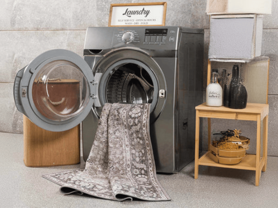 Washable Rug on a laundry day next to a washing machine.