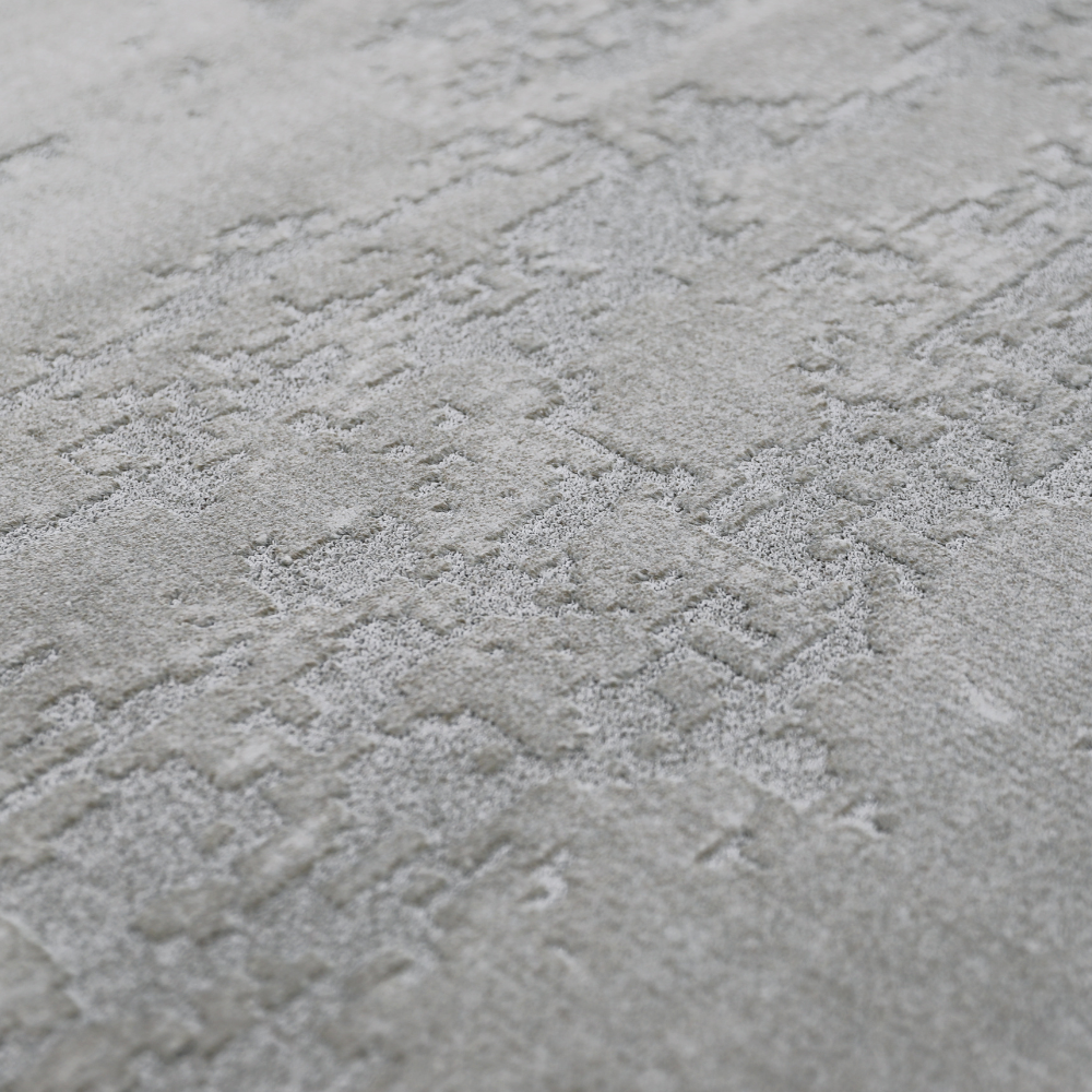 Textured light gray woven rug with intricate patterns for contemporary home decor.
