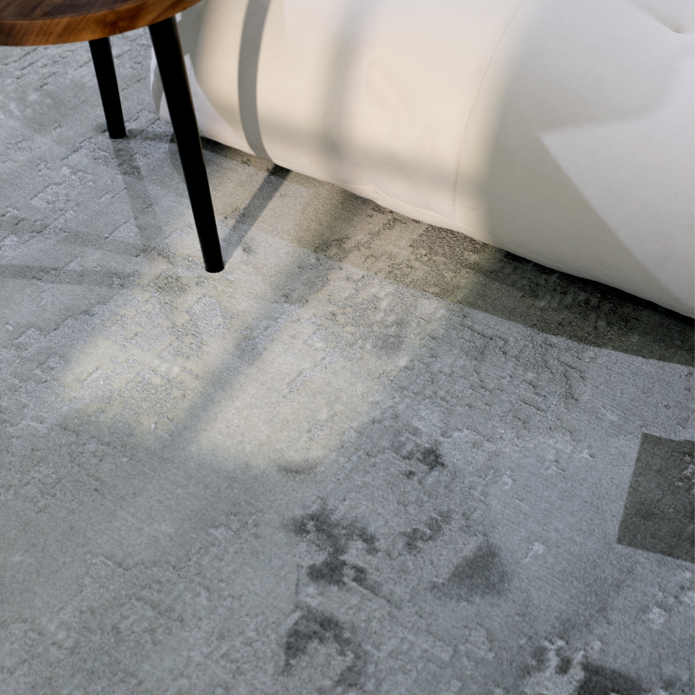 Textured light gray woven rug enhancing a modern living space