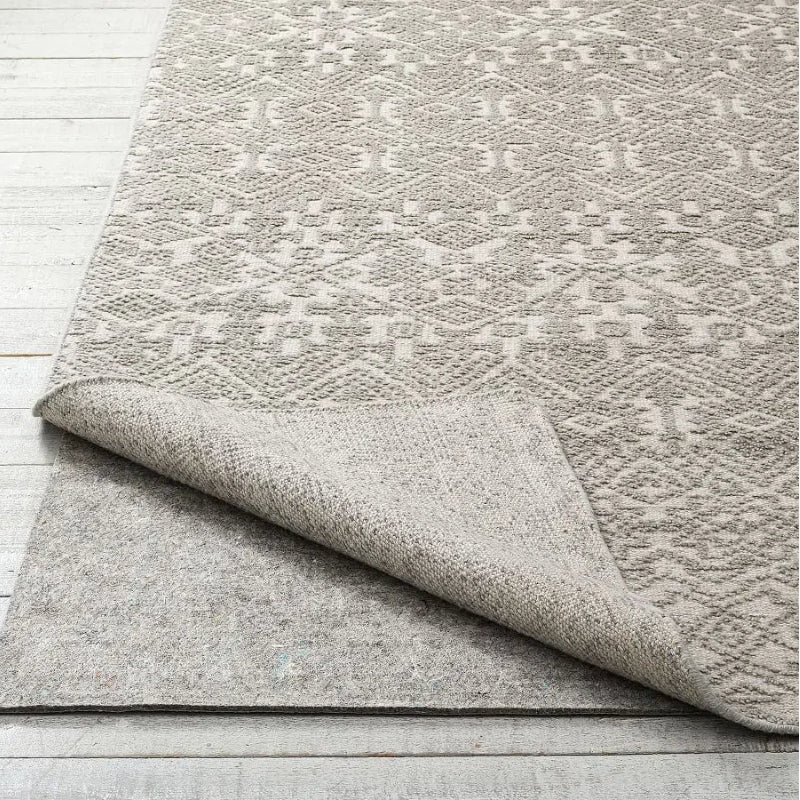 Beige and gray geometric washable rug with nonskid pad