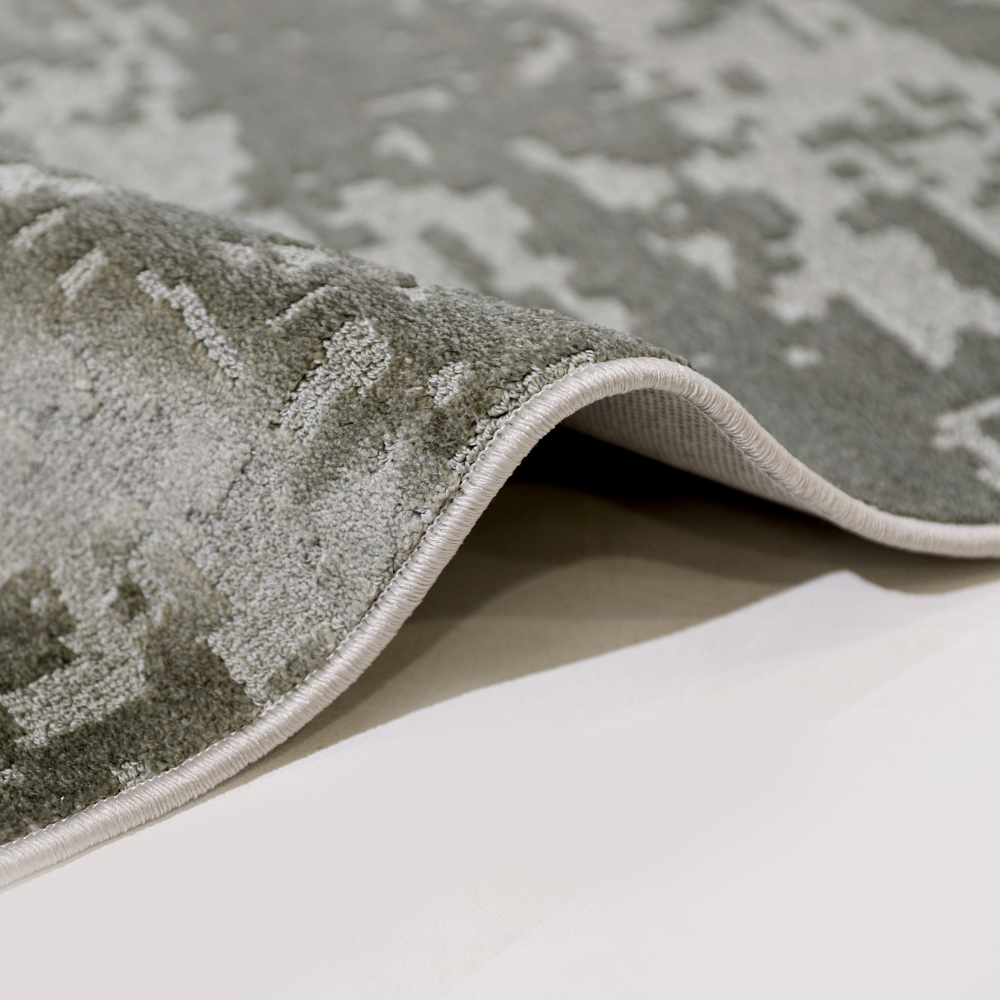 Light gray textured woven rug perfect for contemporary home interiors.