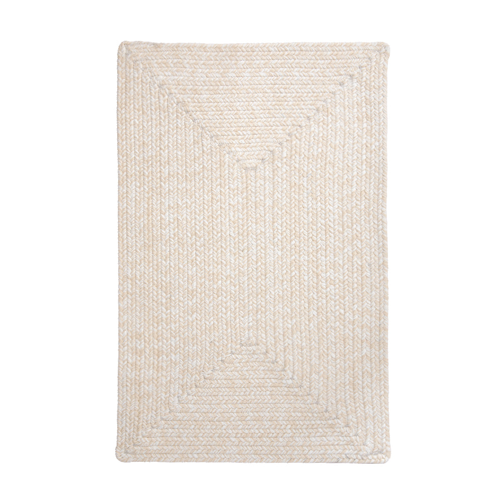 Hand-braided beige outdoor rug with geometric texture