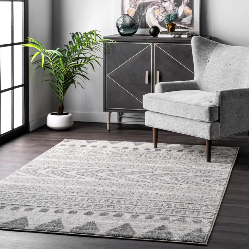 Sorin Tribal Washable Rug with modern gray geometric patterns in a stylish living room