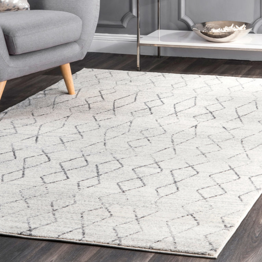 Geometric pattern gray and white washable Moroccan rug in living room setting