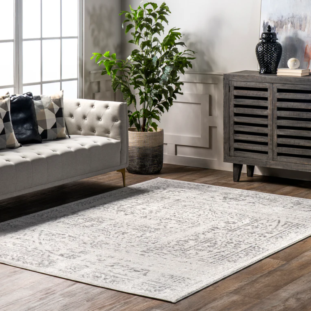 Esme Persian washable rug in gray with intricate design in a modern living room