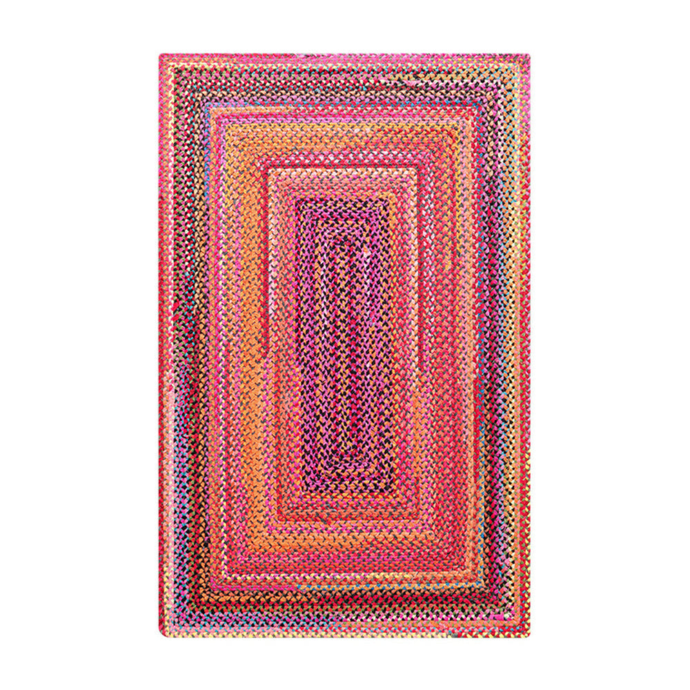 Bohemian Reverie Stripes vibrant woven rug in pink and orange