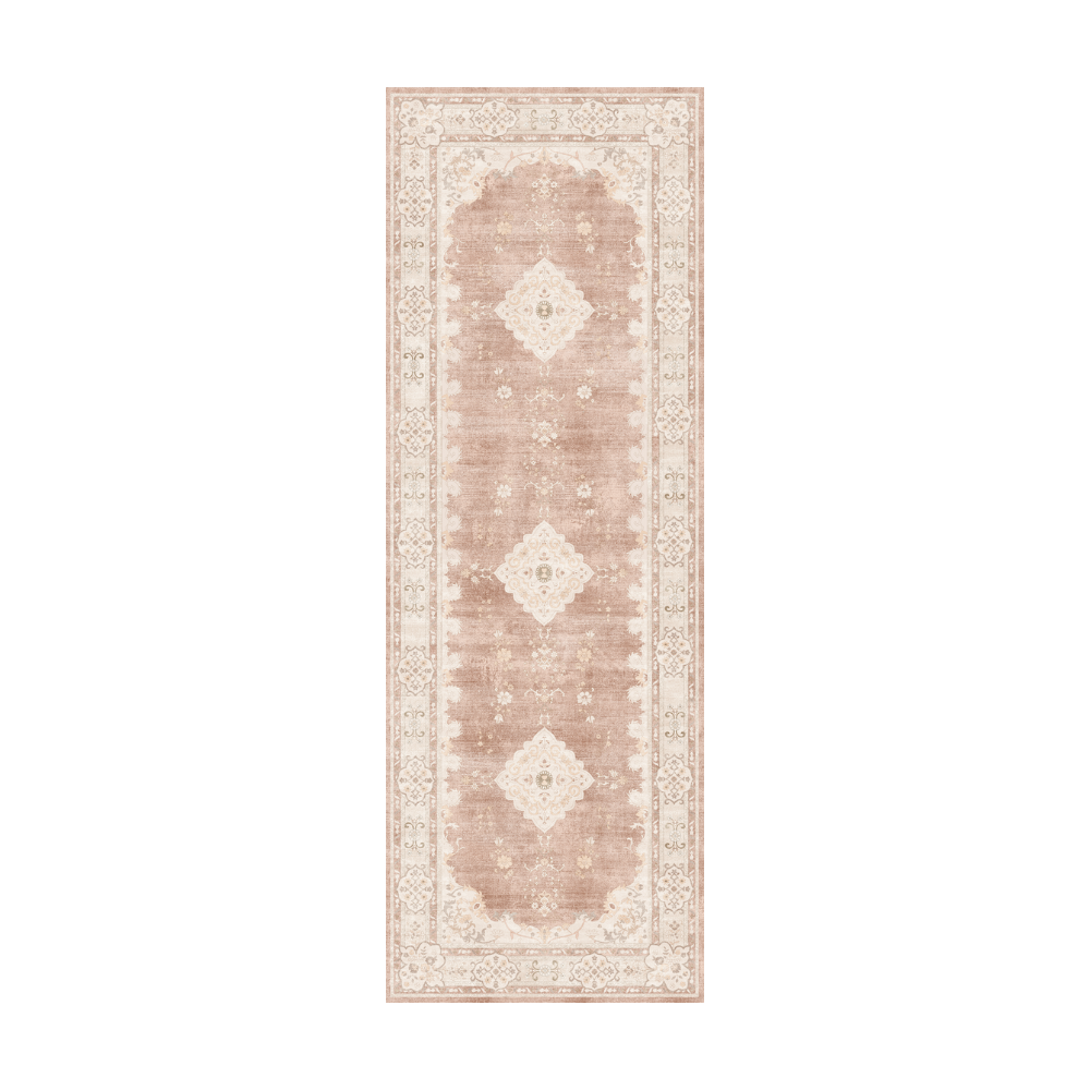 Pink and cream vintage rug with floral patterns for stylish home decor.