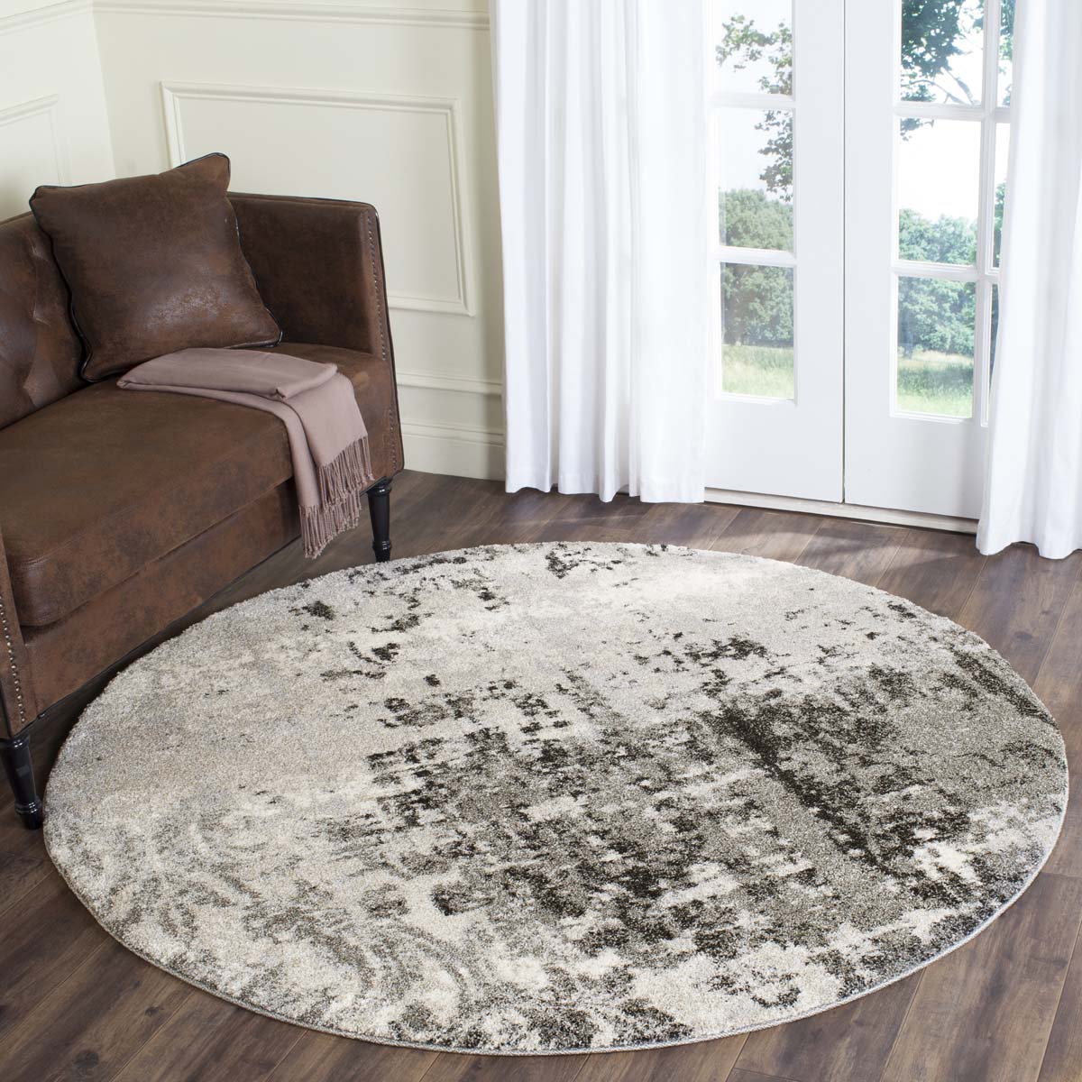 Round Skald Ink Pattern Classical Rug in gray and beige for elegant home decor.