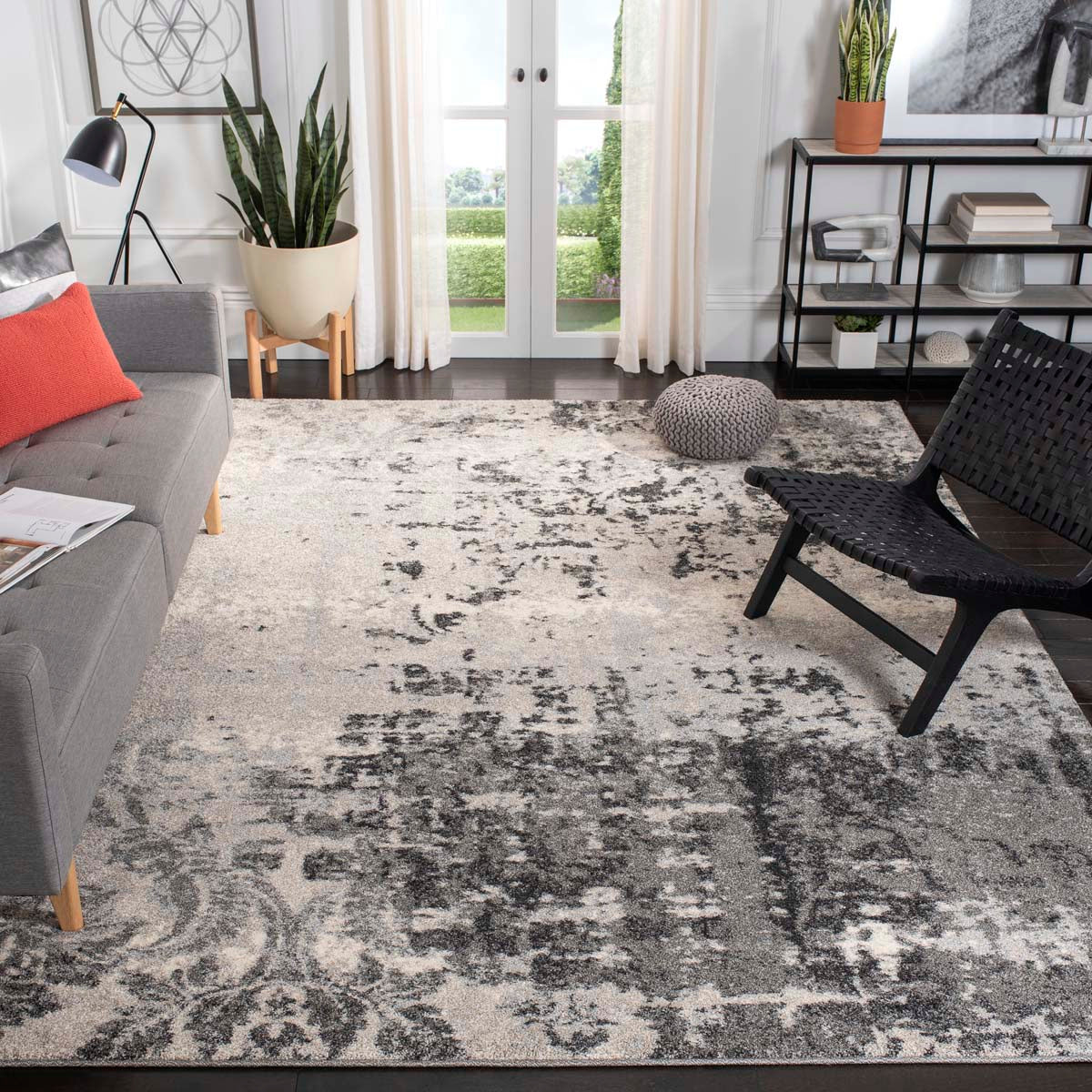 Stylish gray and beige Skald Ink Pattern Classical Rug in a modern living room setting.