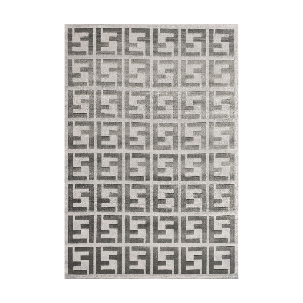 Geometric gray rug with interlocking pattern, perfect for modern homes.