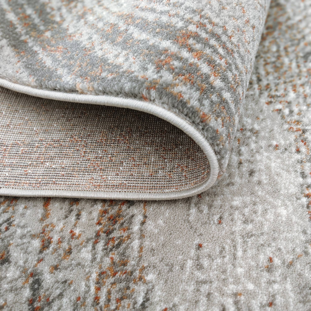 Callum Abstract Textured Rug in gray, beige, and orange tones for modern decor.